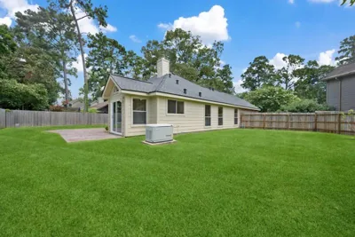 Rear exterior with whole-home standby generator