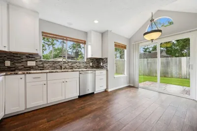 Updated kitchen with sliding door to the backyard